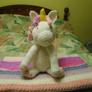 Crochet Lap Blanket & Unicorn stuffed animal.